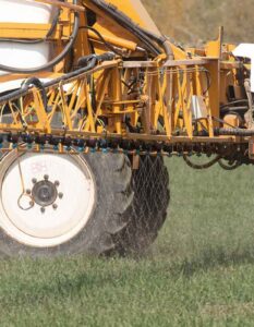 A contractor applying Omex liquid nitrogen to winter wheat